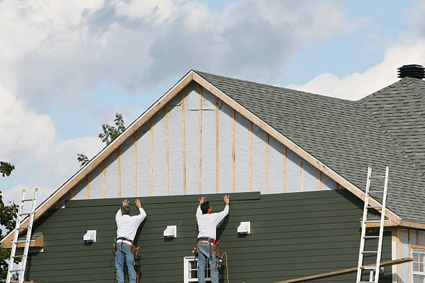 Professional Siding technician working in Rushsylvania, OH